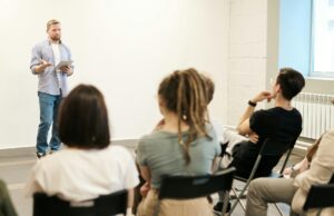 male teacher in front of class