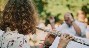 student playing flute
