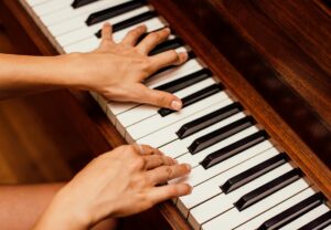 student playing the piano