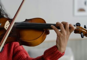 student playing the violin