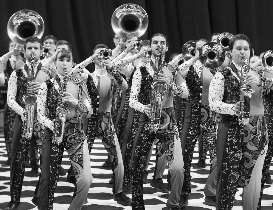 An indoor marching band performance.