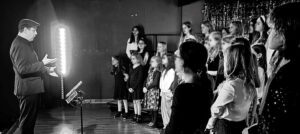Jeremy Bartunek and his choir performing