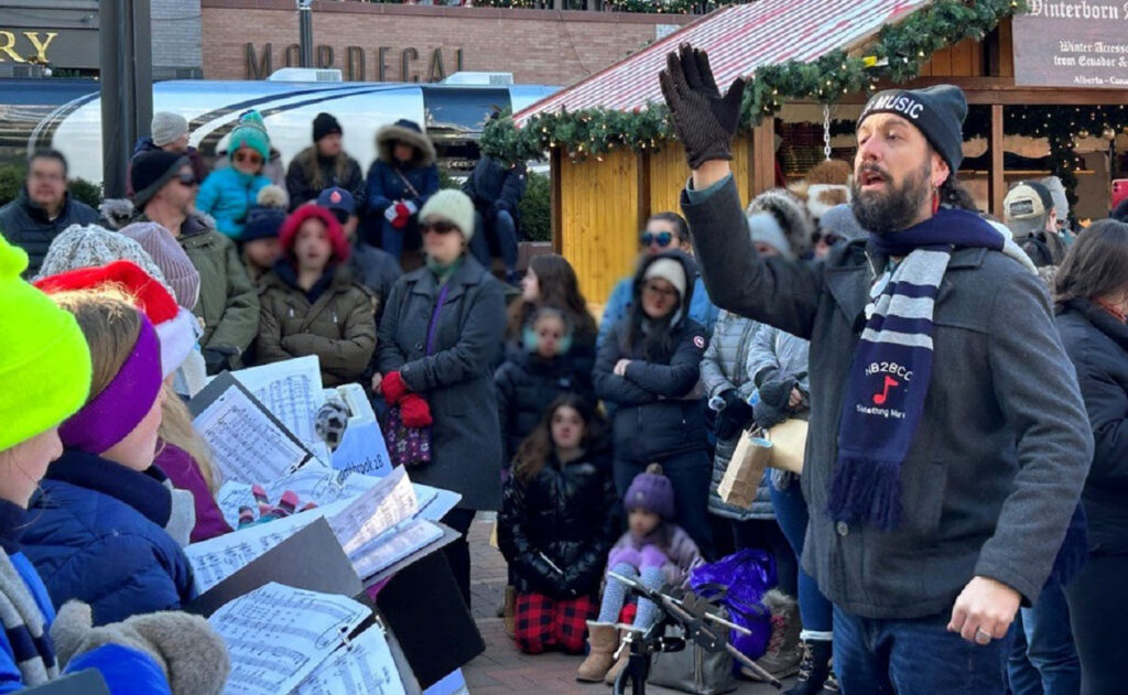 Jeremy Bartunek and his choir performing