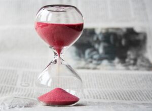 hour glass with red sand