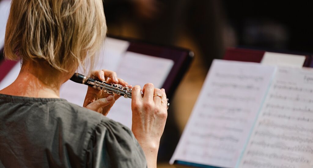 woman playing piccolo