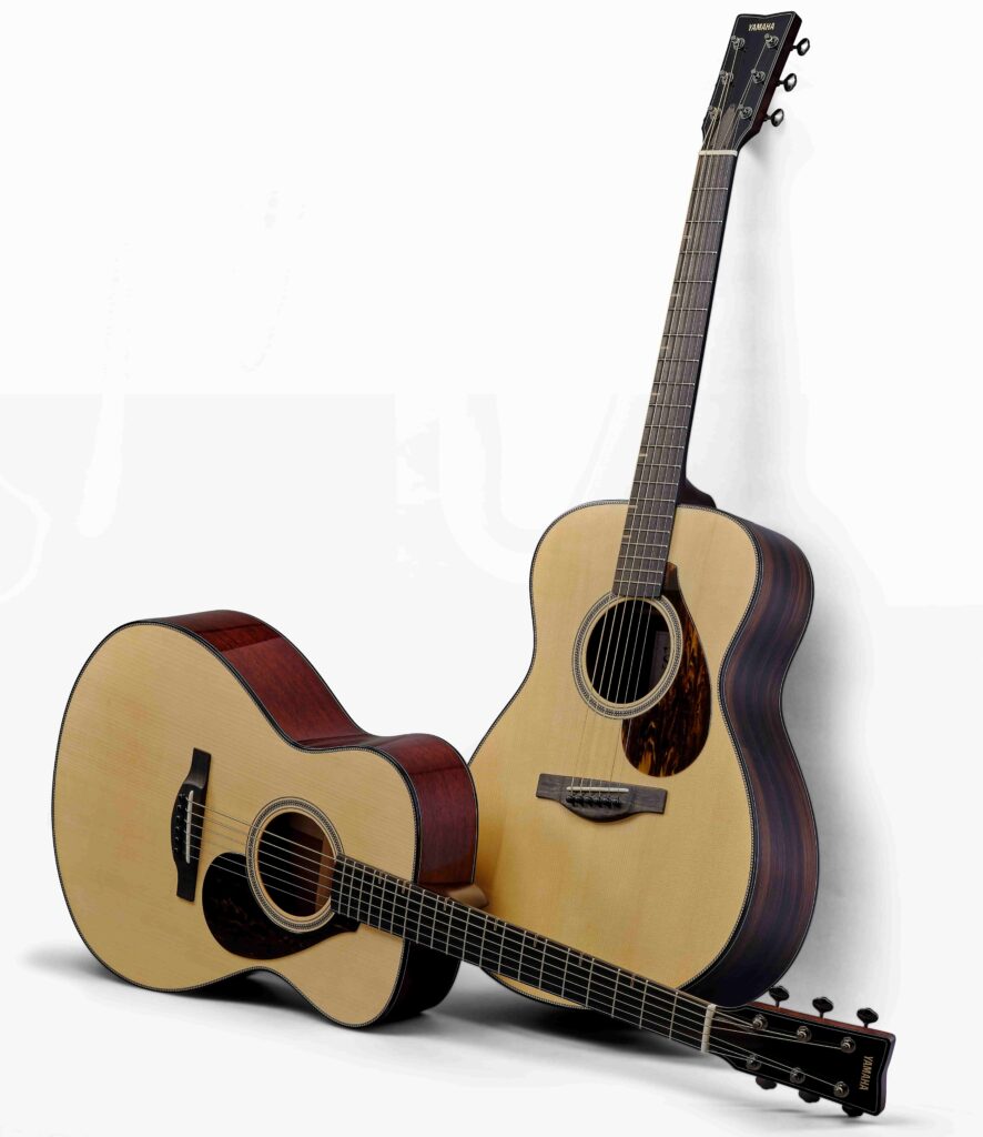 Two acoustic guitars.