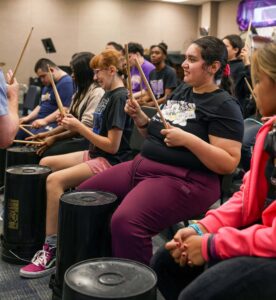 bucket drumming class at Johansen High School