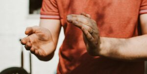closeup of man clapping